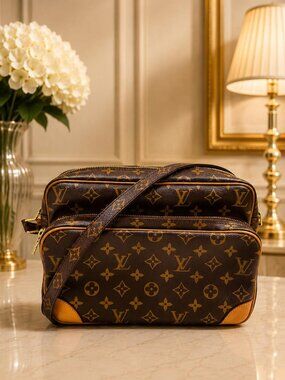 Authentic Louis Vuitton Nile Monogram Canvas Shoulder Crossbody Bag